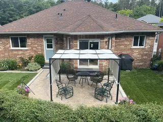 Shade pergola over a paver patio — Golden Maple project